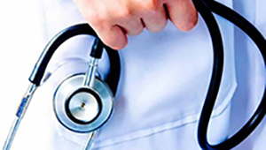physician hand holding a stethoscope